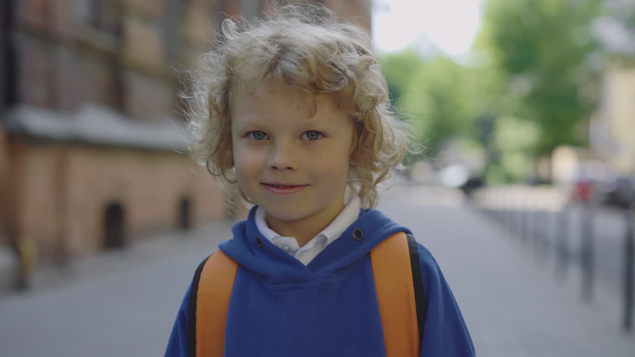Smiling Boy with Backpack