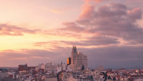 madrid gran via skyline during cloudy sunset timelapse day to night copy space at the top