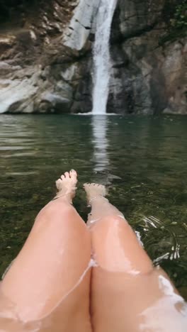 relaxing at a waterfall