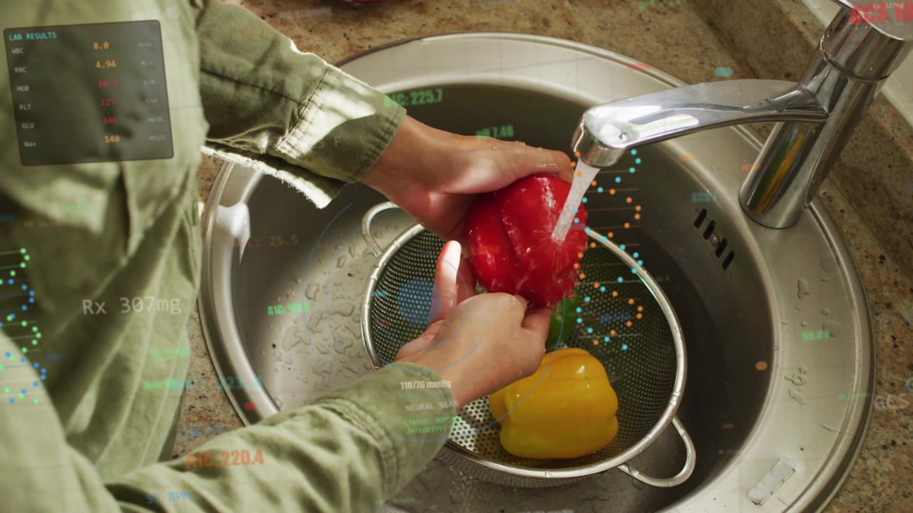 Woman turning faucet and rinsing red pepper under tap for cleaning, kitchen HUD tracking water flow