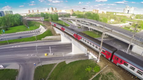 Moving-suburban-electric-train-on-the-bridge-near-the-junction