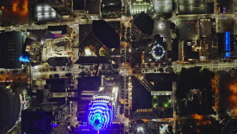 charlotte north carolina aerial v118 vertical flyover tryon street through city center capturing illuminated downtown with towering high rise buildings at night - shot with inspire 3 8k - oct 1st 2023