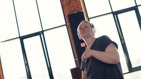 woman dancing indoors