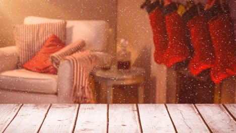 blurred background of a living room decorated for christmas combined with falling snow