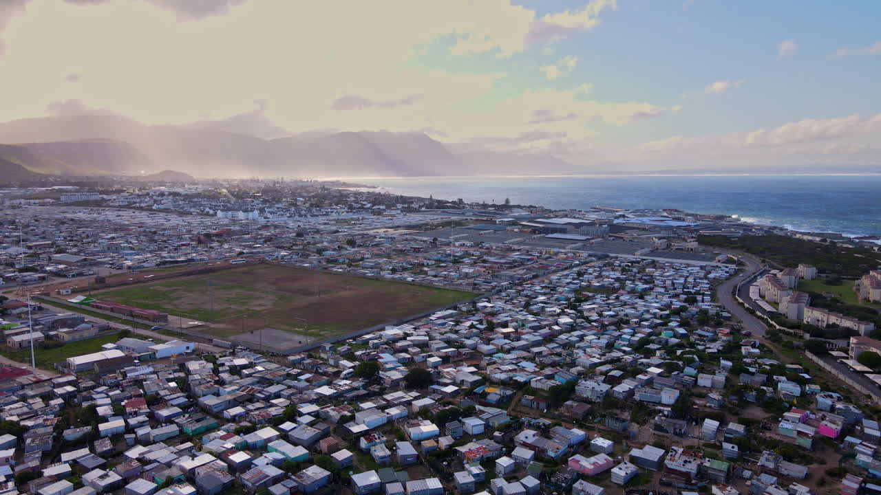 Sunrise aerial riser view over squatter camp township in Hermanus South Africa