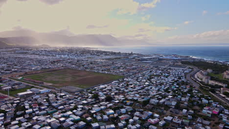 Sunrise aerial riser view over squatter camp township in Hermanus South Africa