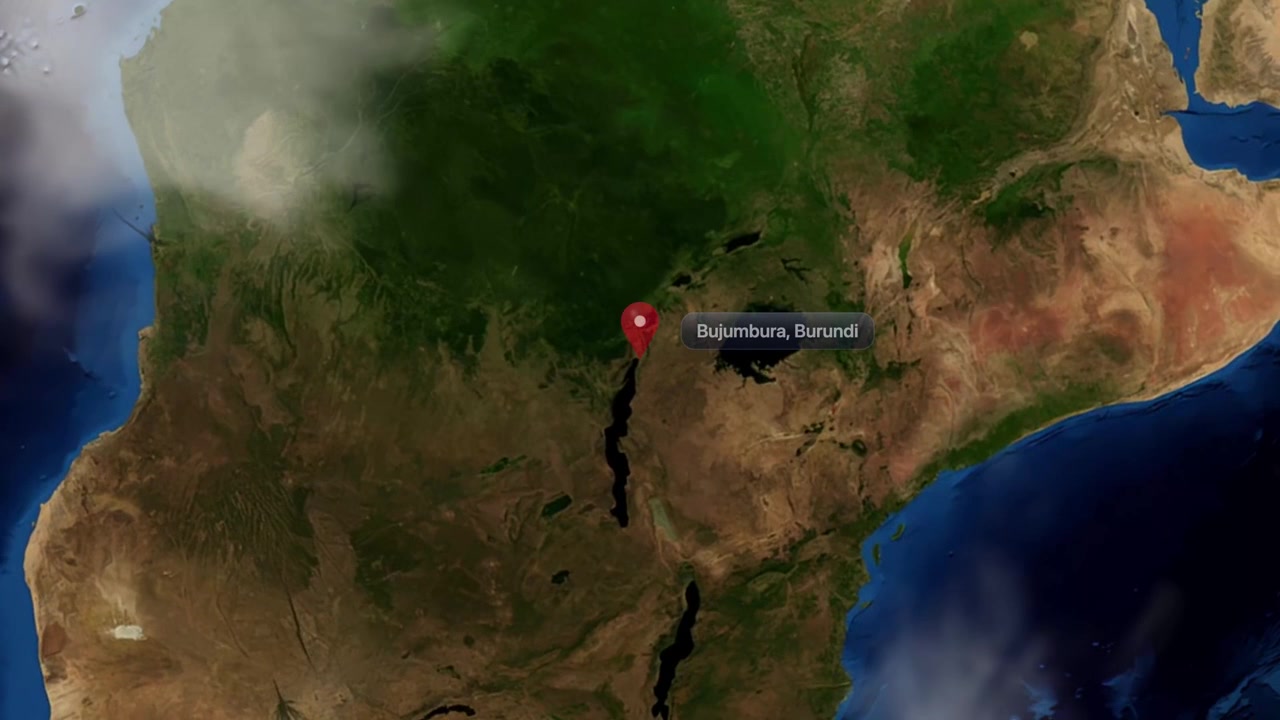 Animazione 3D realistica di un satellite che zooma dal pianeta Terra su Bujumbura, Burundi, con segnaposto. Include immagini di pubblico dominio della NASA