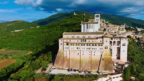 unesco world heritage site - basilica of saint francis during sunset in assisi, umbria, central italy