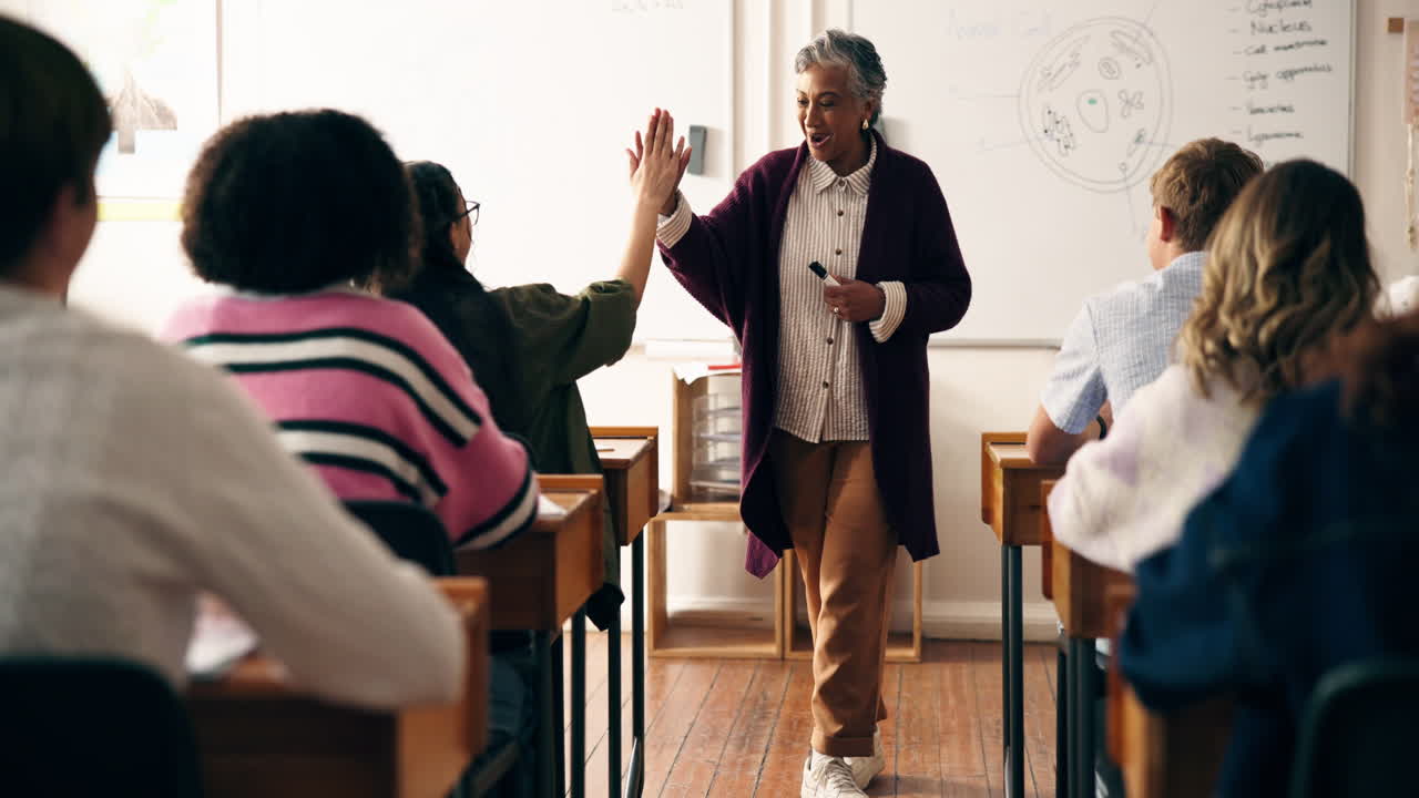 Teacher lecturing students in a classroom