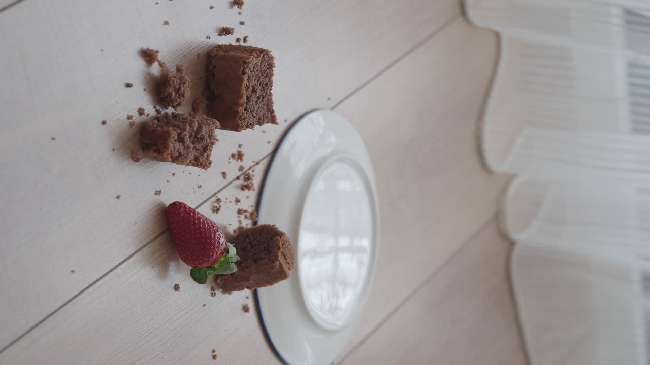 Chocolate Cake and Strawberries on Wooden Table