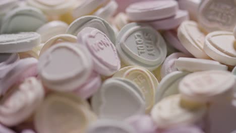 full frame shot of heart candy with romantic messages of love