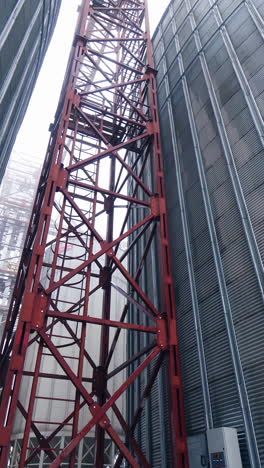 big steel elevator construction storage. industrial agriculture farming equipment. vertical video
