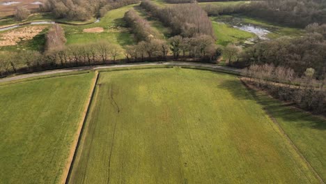 aerial view of dutch countryside with road and fields