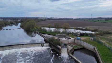 Pull-back-drone-aerial-Knottingley-Weir-Hydroelectric-power-plant-west-Yorkshire-UK