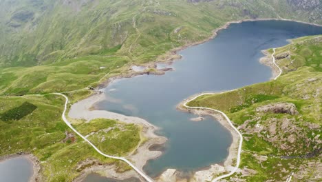 cinematic flyover of lake llyn llydaw in snowdon national park wales