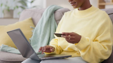 black woman, laptop and e commerce with credit