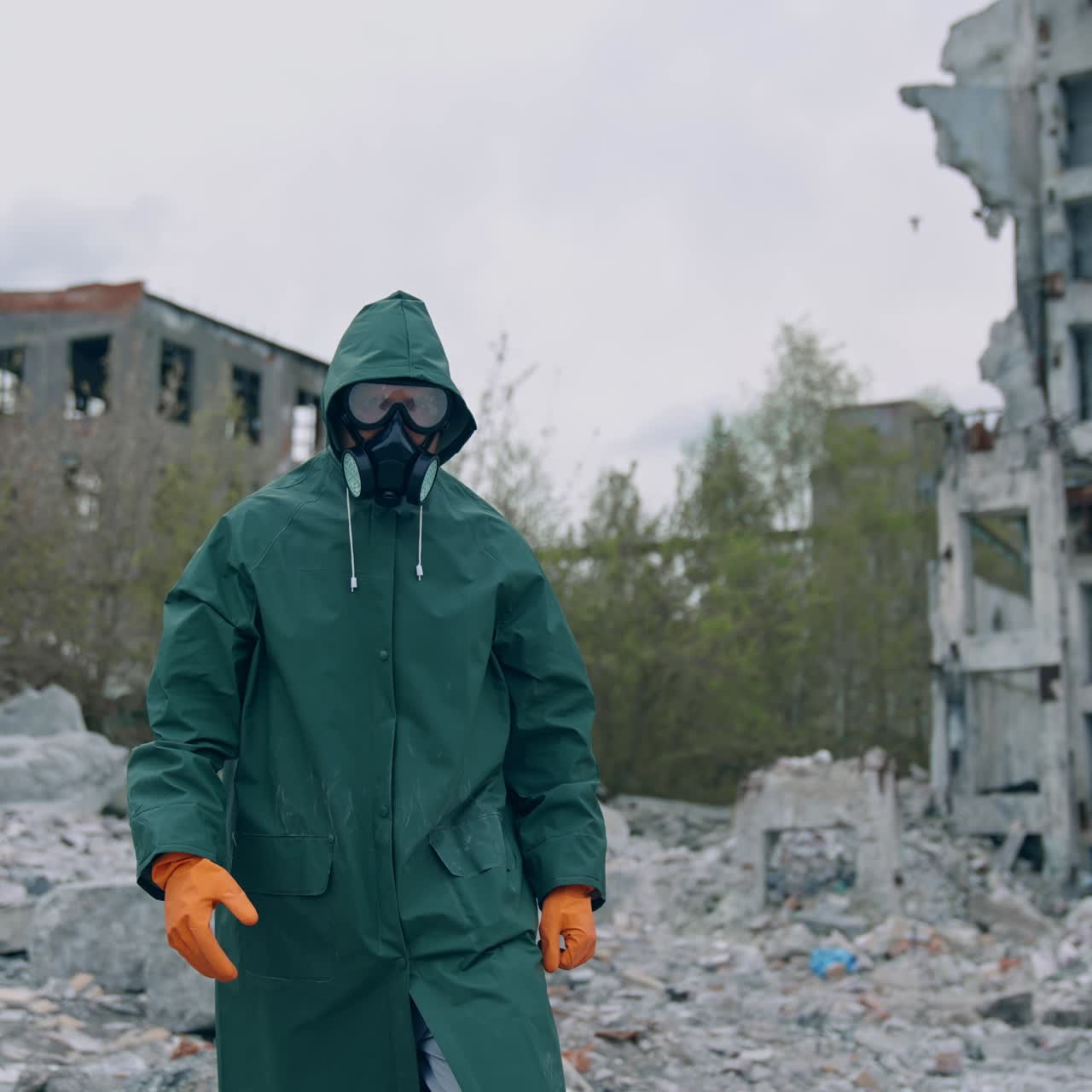 Man in protective suit and antigas mask with glasses. Safety virus infection concept