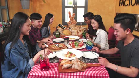 friends enjoying a meal in a restaurant