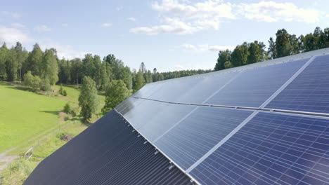 solar panels mounted on roof of building in countryside