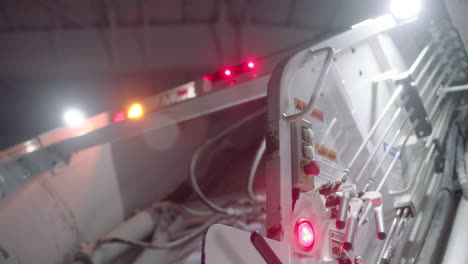 track back from a garbage truck with warning lights flashing