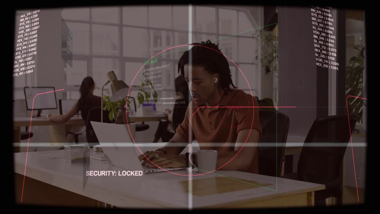 Male office worker reading doc, typing, glancing as HUD overlay appearing and tracking for security