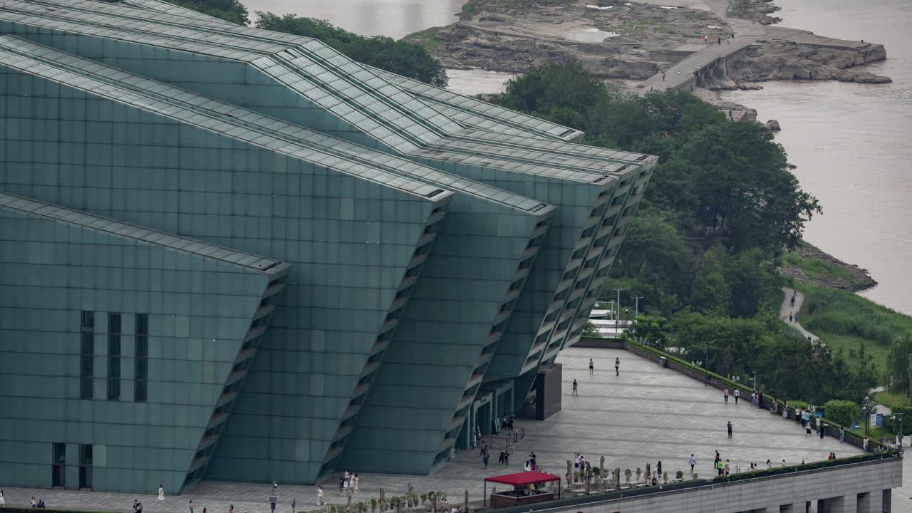 Timelapse of the amazing Chongqing cyberpunk city skyline from a high vantage point with the yangtze river