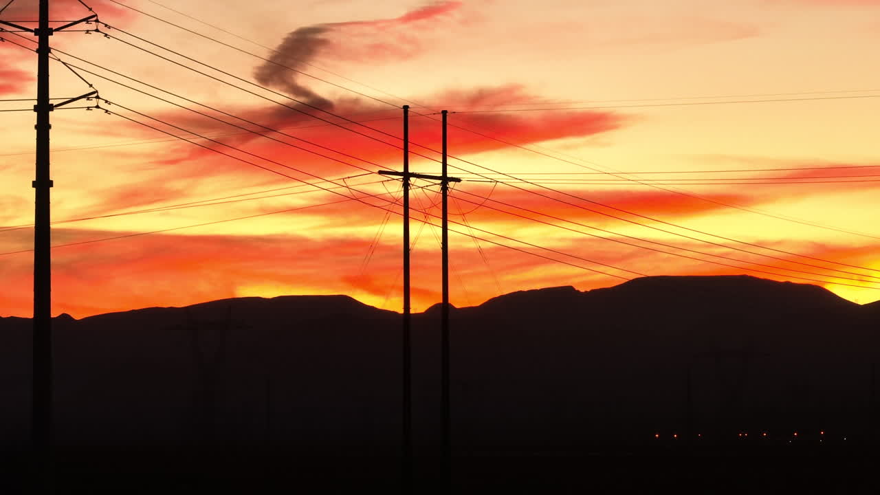 Silhouette of High Tension Power Transmission Lines During Sunset, Aerial