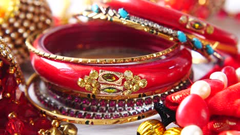 red and gold indian bangles and jewelry