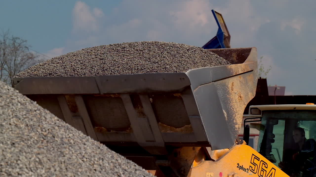 Large heavy loader. Wheel bulldozer for mechanization of loading