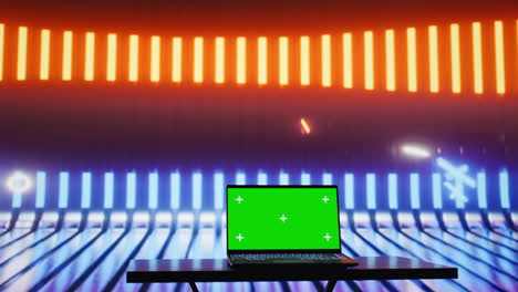 empty glowing neon lit space with vivid colors and green screen display