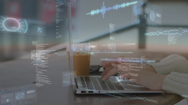 Softwareudvikler, der taster på en bærbar computer, og som starter holografiske kodeoversigter og audiobølger for at se data