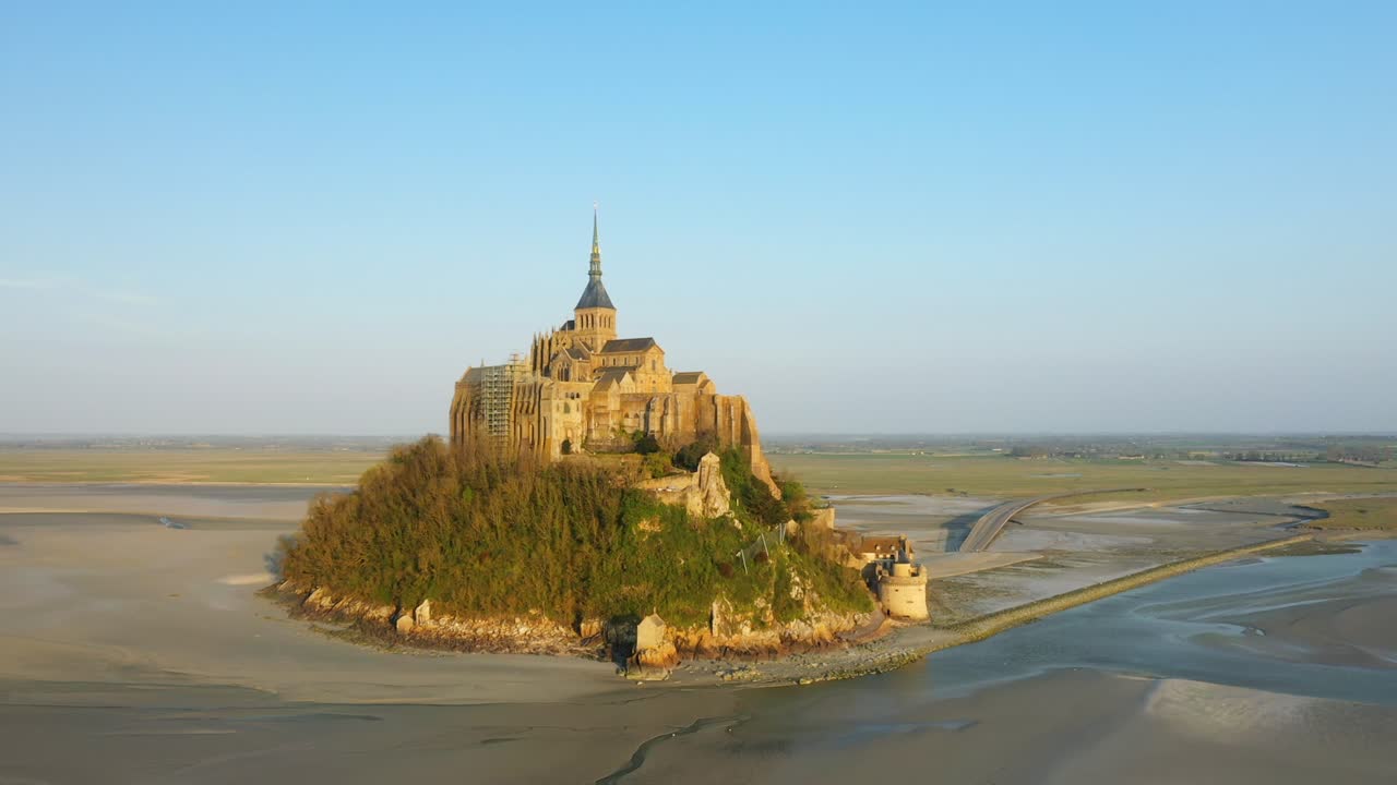Mont Saint Michel facing the Normandy countryside in Europe, France, Normandy, Manche, in spring, on a sunny day.