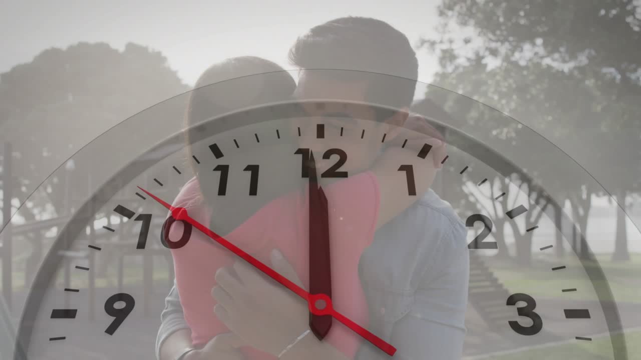 Couple embracing heart-shaped cushion in health campaign, analog clock overlay showing time passing