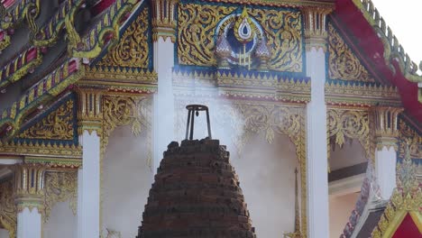 thai temple facade with incense