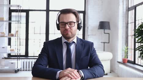 confident support service representative wears headset talking to webcam