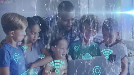 animation of network and icons over happy african america male teacher and schoolchildren
