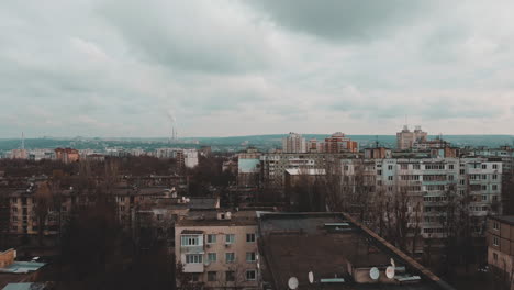 Drone-flying-over-the-roofs-in-Chisináu,-Moldova