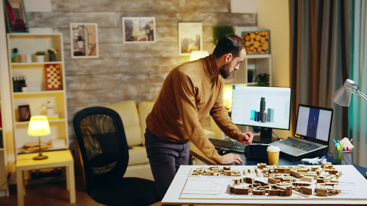 Architect working at night in his home office