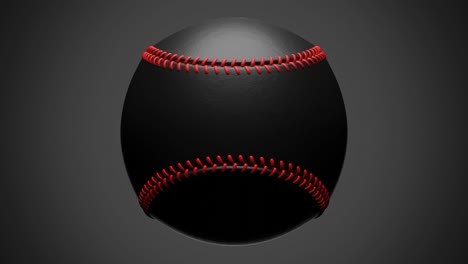 una pelota de béisbol negra aislada sobre un fondo gris.