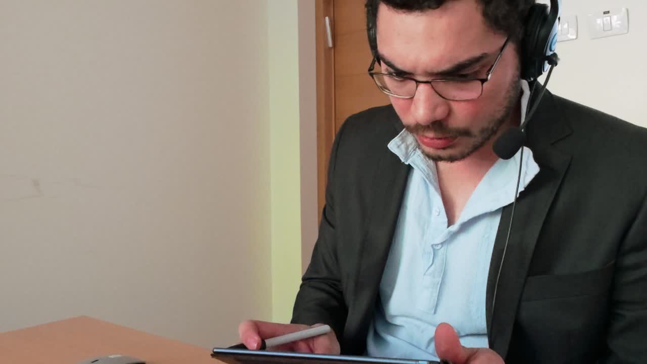 Data Interpretation in Remote Meeting: Man with Tablet