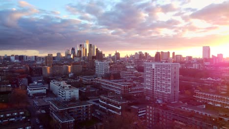 cinematic drone shot skyscrapers and high rises in london at sunset