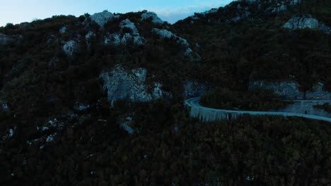 aerial medium shot of mountain road after sunset-9