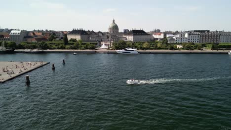 Aerial-of-Boat-at-Amalienborg-Palace,-Copenhagen,-Denmark