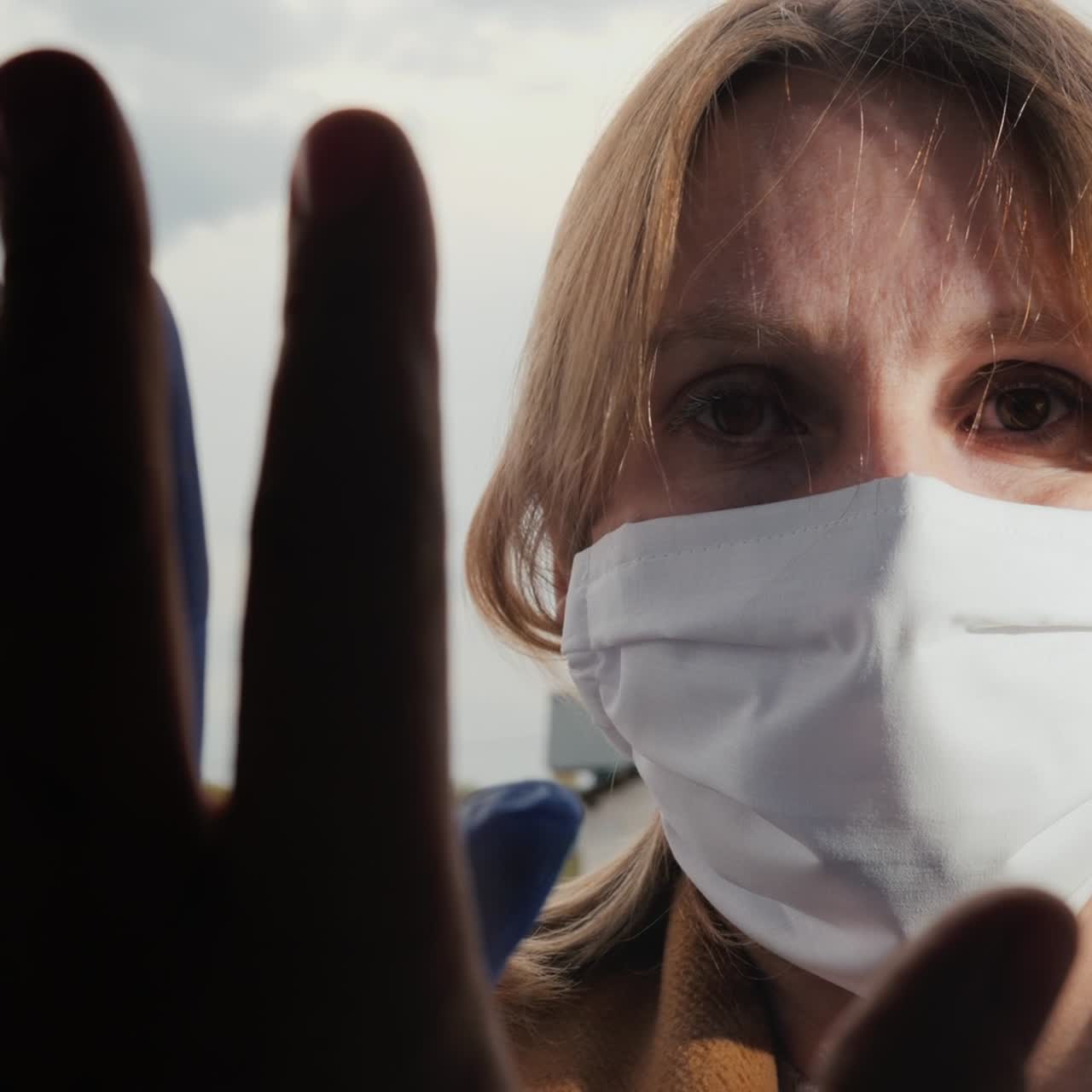 Touch Your Hands Through The Glass During Quarantine And Insulation