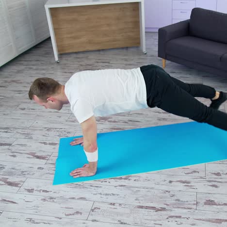 man doing exercises for leg. man doing exercisesfor leg at home on mat