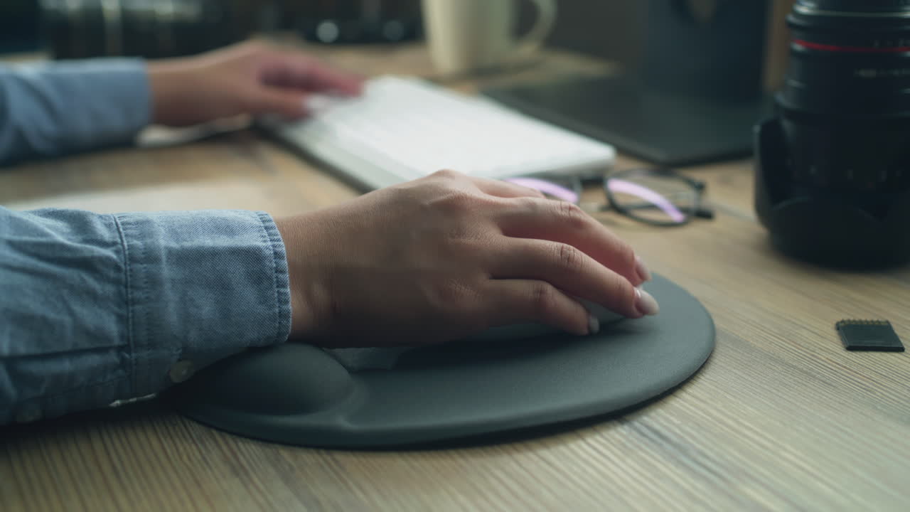 Woman Working Remotely on Pc Using Mouse