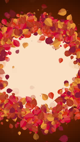 Autumn floral round frame. Wreath made of yellow and red fallen tree leaves. Copy space. Looped dark orange background. Vertical video.