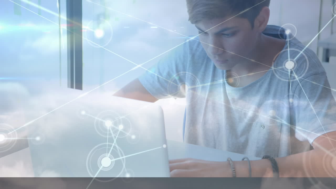 Animation of network of connections over male student using laptop