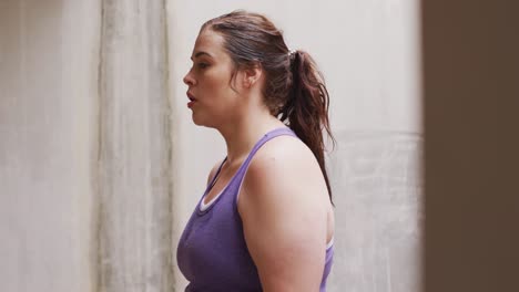 young caucasian woman blowing