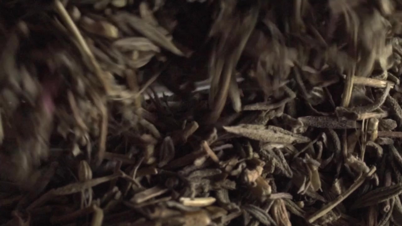 Extreme macro close up of dried culinary herbs highlighting natural texture, earthy color and aromatic ingredients commonly used for cooking, seasoning and food preparation